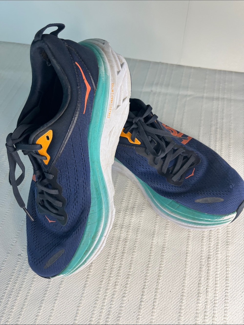 Hoka Men's Athletic Shoes BONDI, Navy aqua, orange, with white sole sz 8.5B used